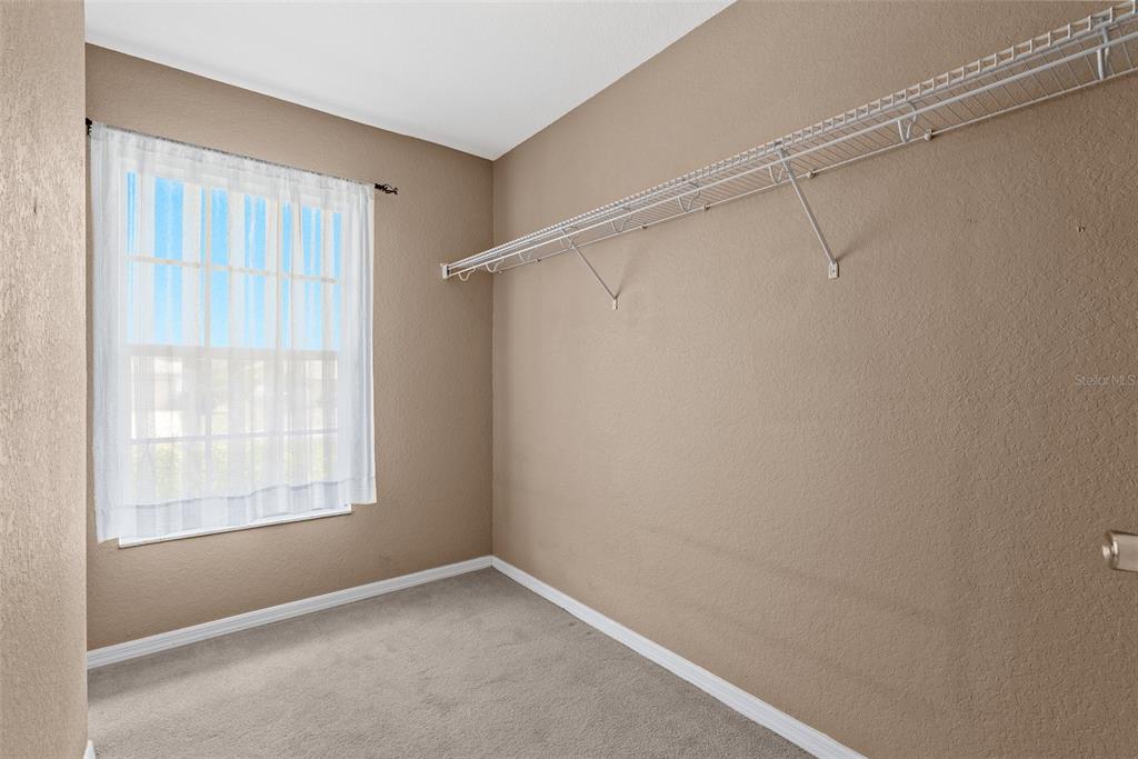 11366 Riddle Drive Spring Hill, FL 34609 - Photo 31 of 49 a view of an empty room with a window