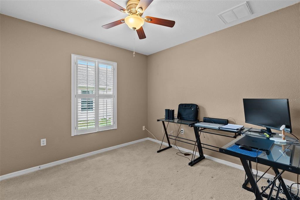 11366 Riddle Drive Spring Hill, FL 34609 - Photo 36 of 49 a view of a workspace with a window