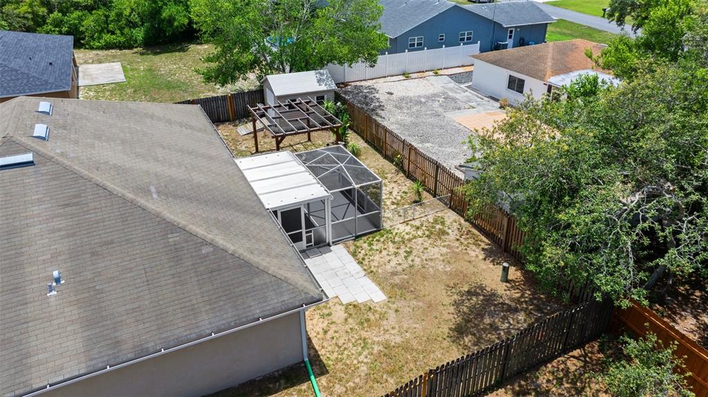 11366 Riddle Drive Spring Hill, FL 34609 - Photo 4 of 49 an aerial view of a house with outdoor space