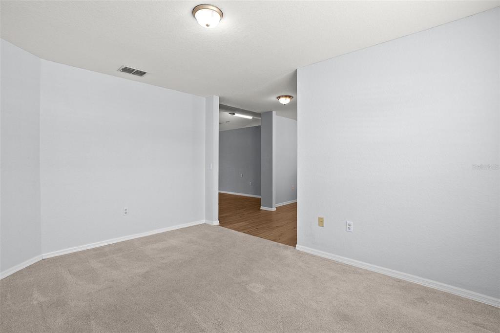 11366 Riddle Drive Spring Hill, FL 34609 - Photo 6 of 49 an empty room with an entryway
