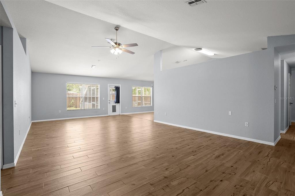 11366 Riddle Drive Spring Hill, FL 34609 - Photo 9 of 49 a view of livingroom and hardwood floor
