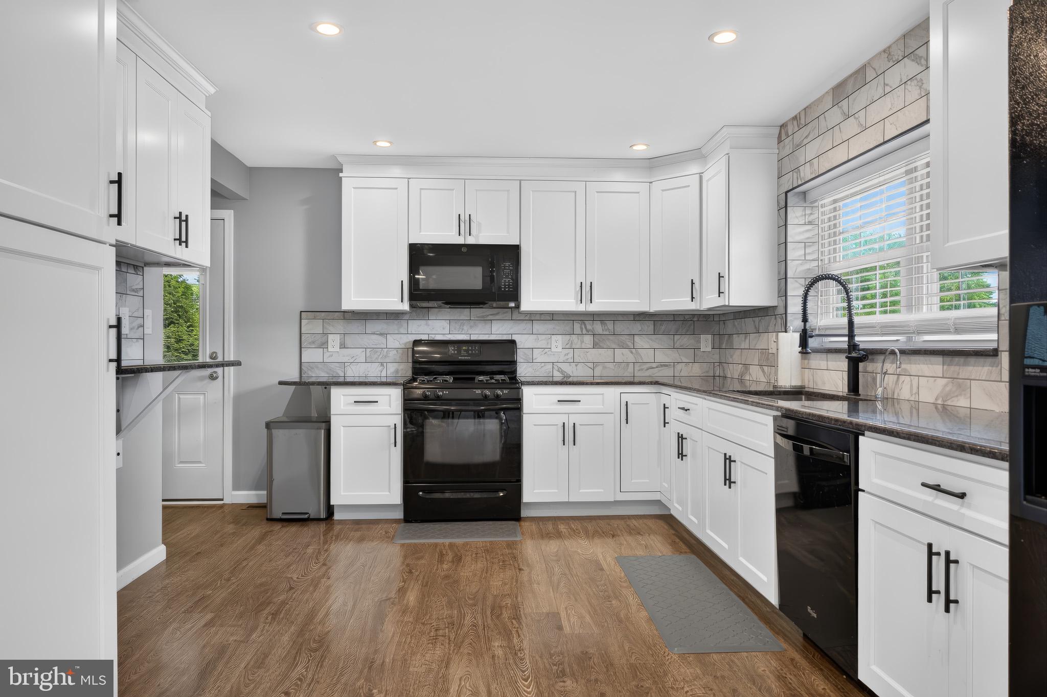 413 Broad Street Perkasie, PA 18944 - Photo 20 of 42 Modern kitchen with sleek finishes.