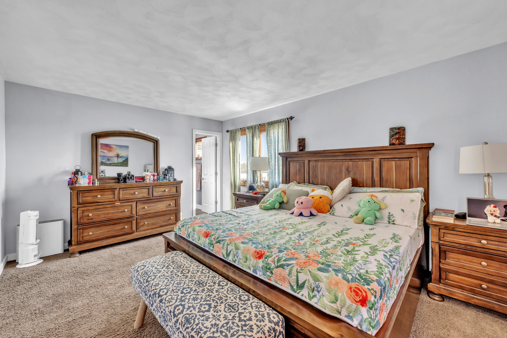 6338 Thicket Lane Cherry Valley, IL 61016 - Photo 16 of 43 a bedroom with a bed and dresser