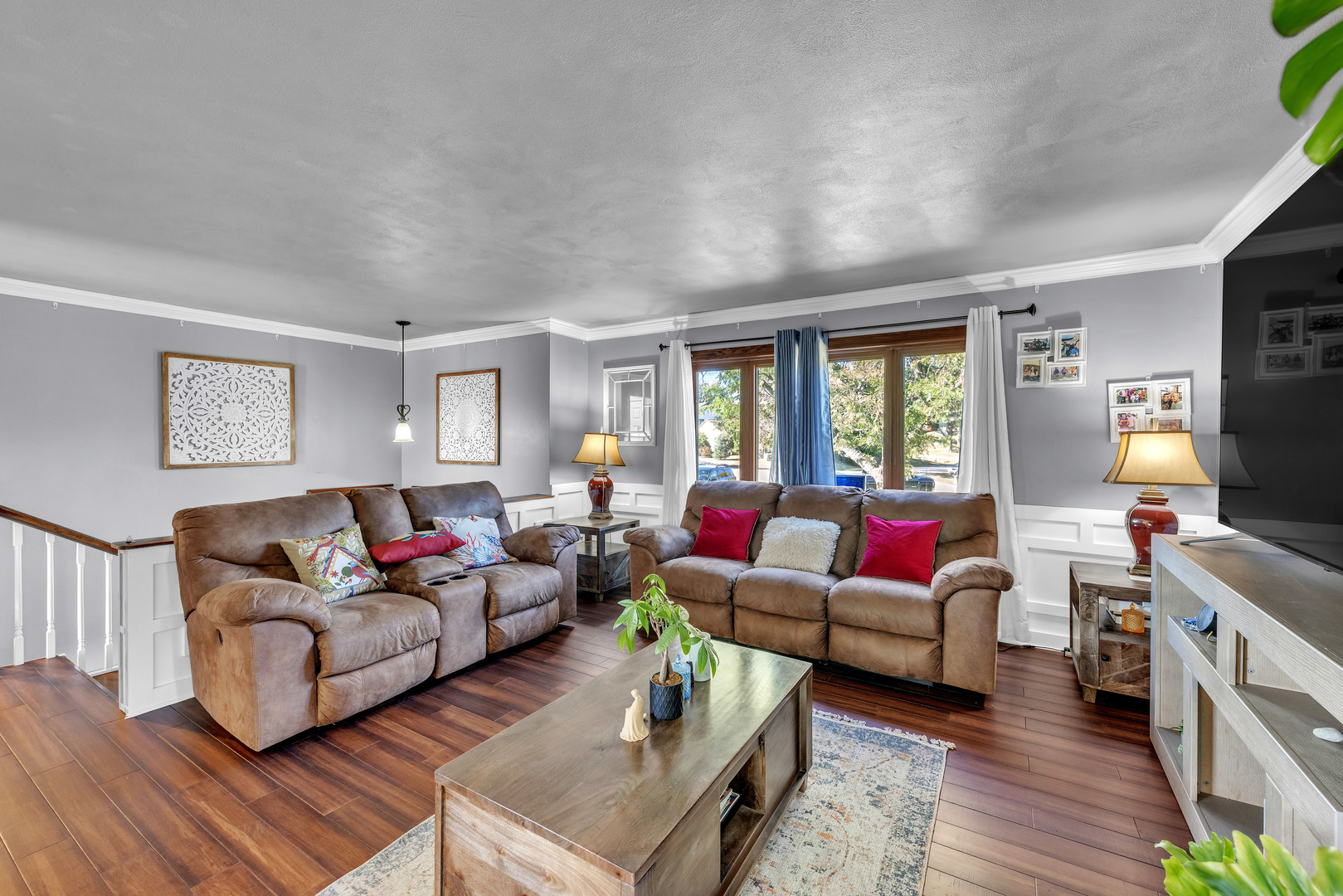 6338 Thicket Lane Cherry Valley, IL 61016 - Photo 6 of 43 a living room with furniture and a flat screen tv