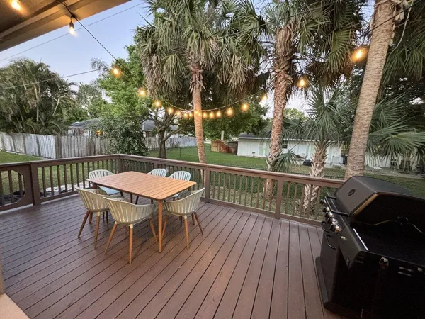 a view of a chairs on the roof deck