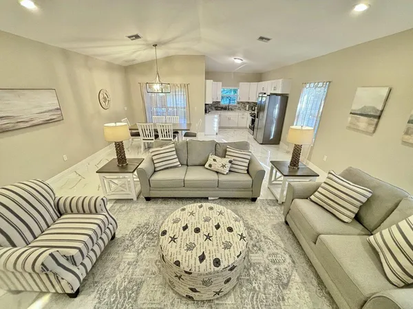 a living room with furniture and a couch