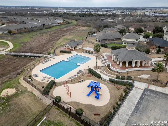an aerial view of a house with a garden