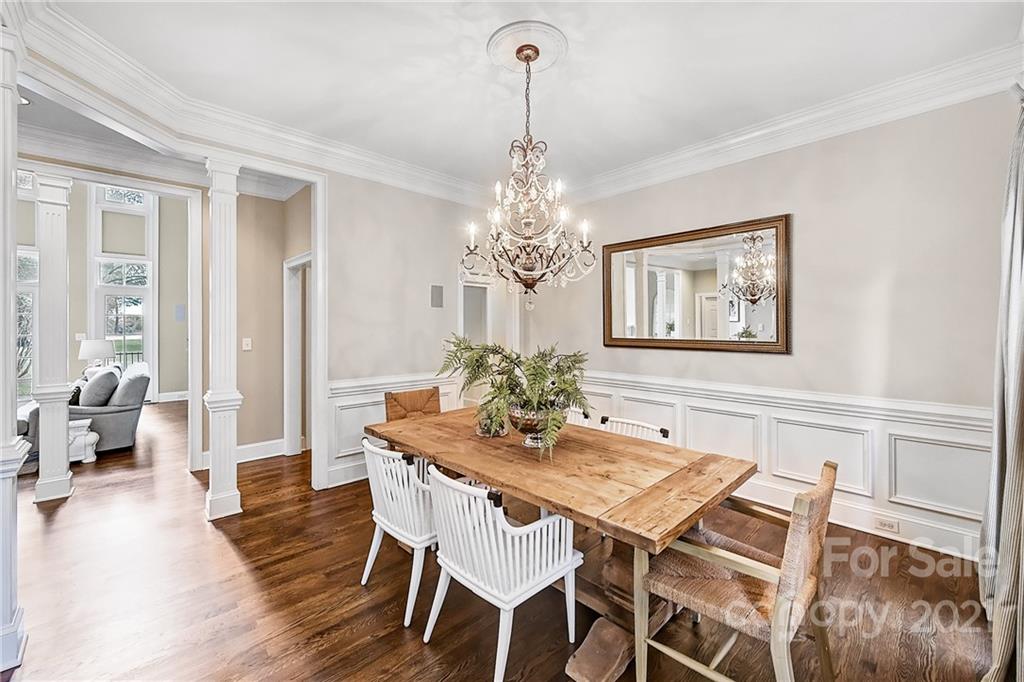 2826 Sharon Road Charlotte, NC 28211 - Photo 11 of 47 a view of a dining room with furniture window and wooden floor