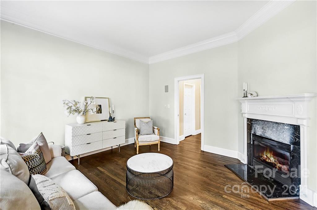 2826 Sharon Road Charlotte, NC 28211 - Photo 13 of 47 a living room with furniture and a wooden floor