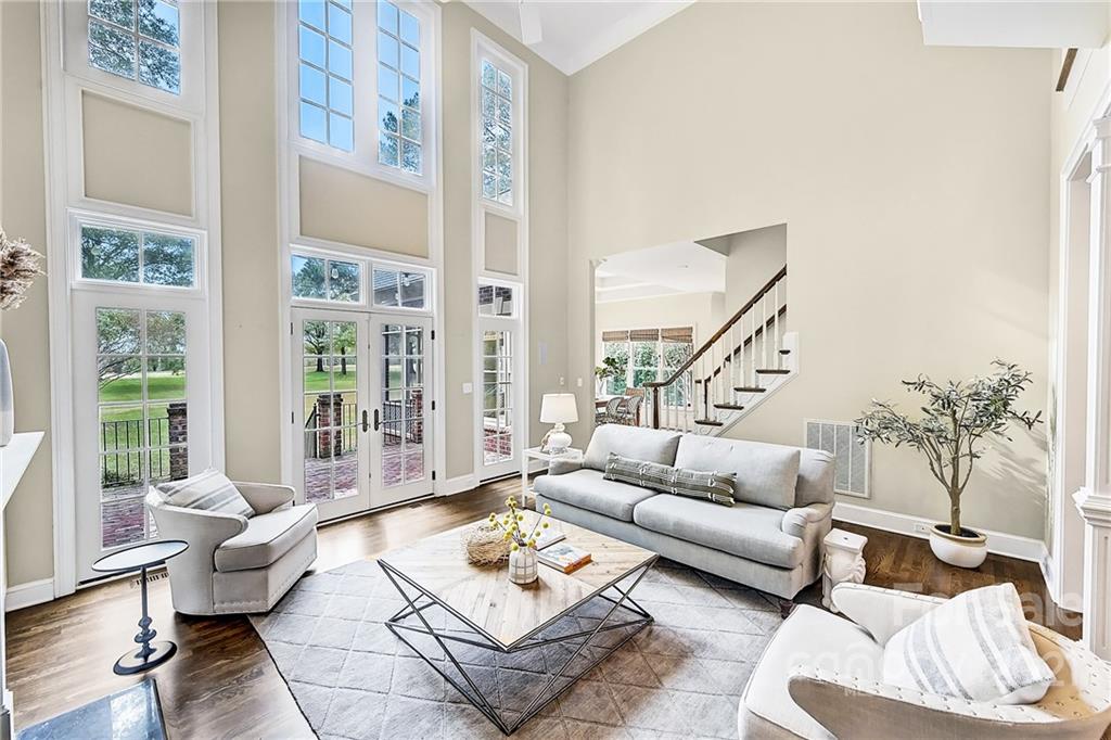 2826 Sharon Road Charlotte, NC 28211 - Photo 19 of 47 a living room with furniture and a large window with outer view