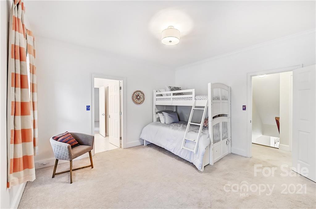 2826 Sharon Road Charlotte, NC 28211 - Photo 38 of 47 a bedroom with furniture and white walls