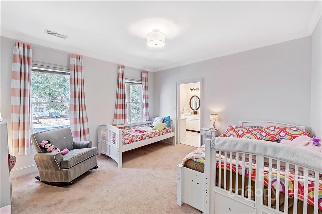 2826 Sharon Road Charlotte, NC 28211 - Photo 39 of 47 a bedroom with furniture and a bed