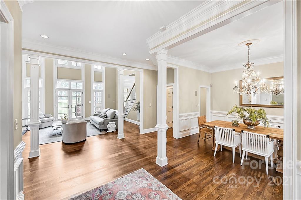 2826 Sharon Road Charlotte, NC 28211 - Photo 8 of 47 a dining room with wooden floor and furniture