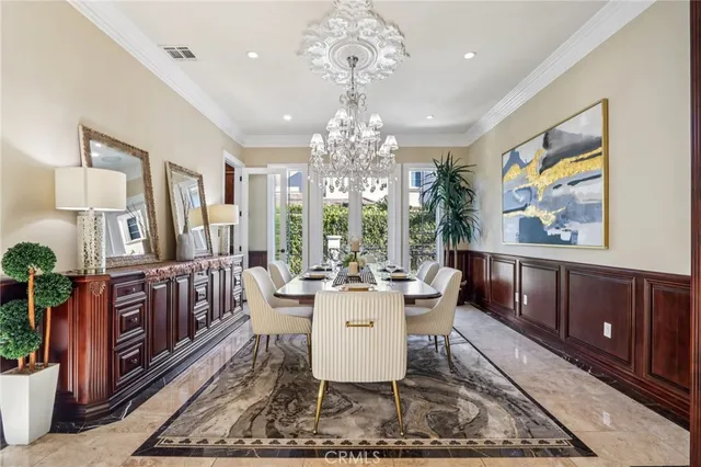 a bedroom with a bed and a lamp