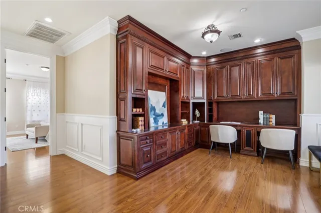 a bathroom with a sink vanity granite toilet and shower