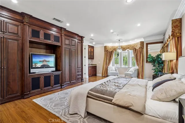 a kitchen with granite countertop a counter space chairs and cabinets