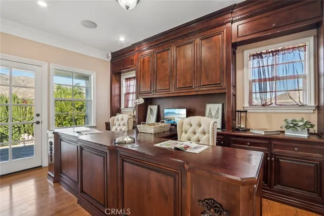a view of a chair and table in the balcony