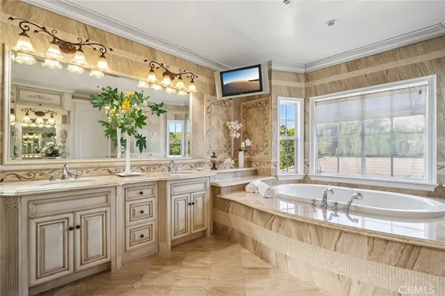 front view of a brick house with a yard