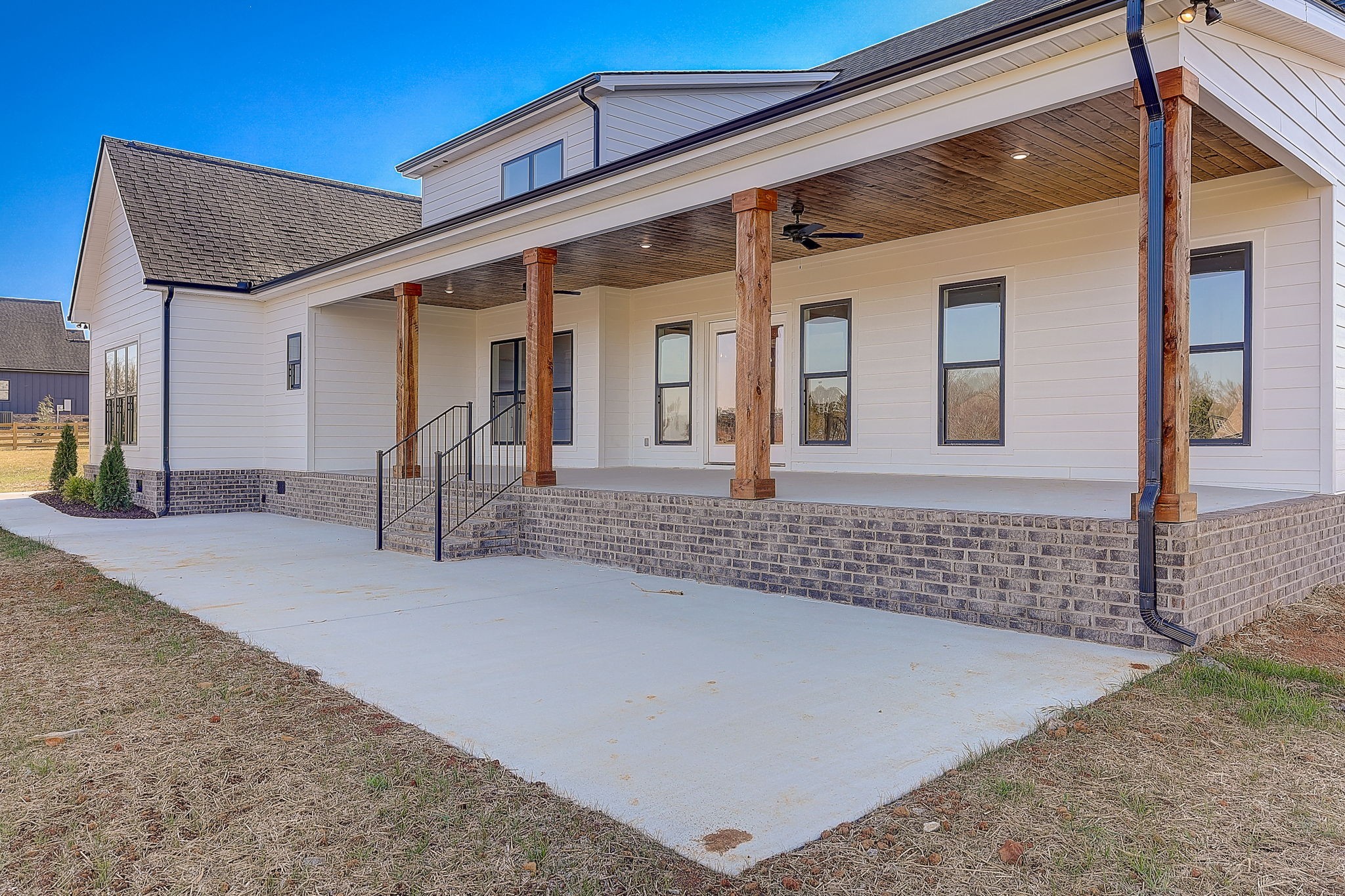 9665 McKee Road Lascassas, TN 37085 - Photo 13 of 15 a front view of a house with a porch