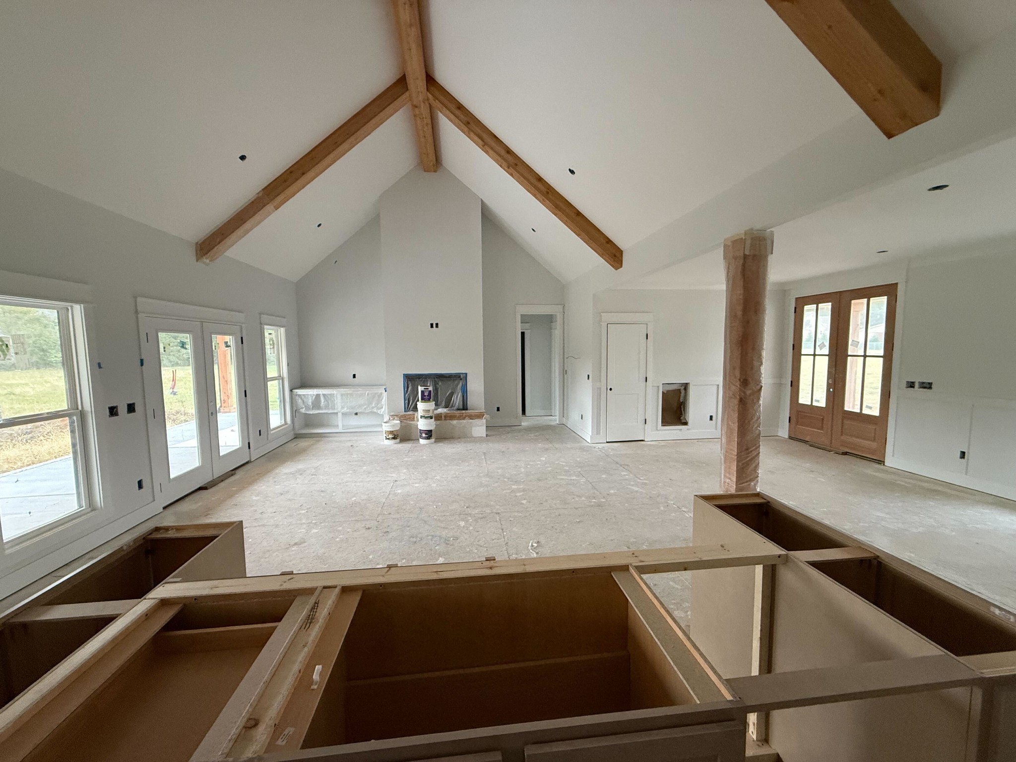 9665 McKee Road Lascassas, TN 37085 - Photo 5 of 15 a view of a kitchen with a sink and dishwasher a stove top oven with wooden floor