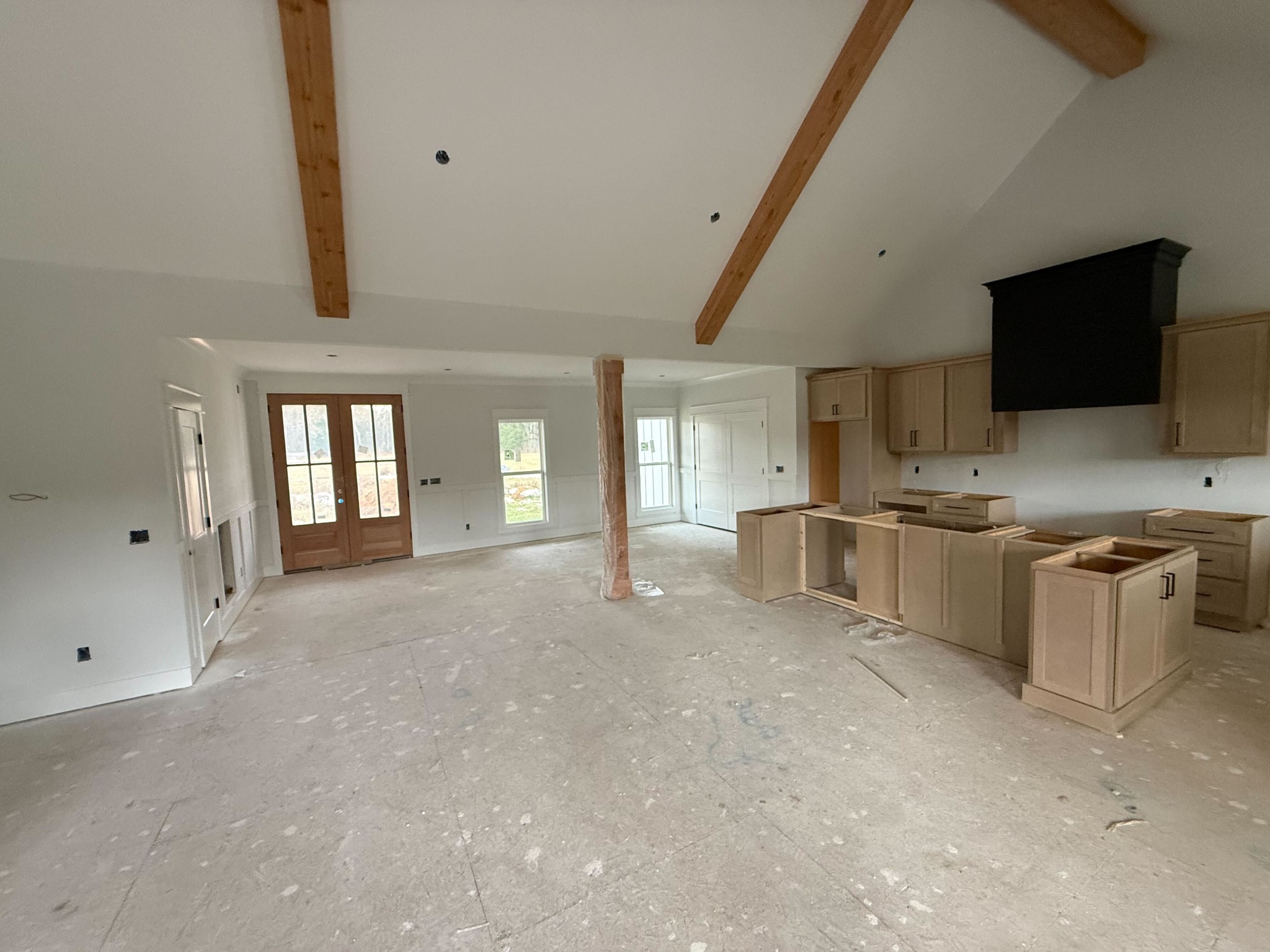 9665 McKee Road Lascassas, TN 37085 - Photo 6 of 15 a view of a kitchen with a sink and dishwasher a stove top oven with wooden floor