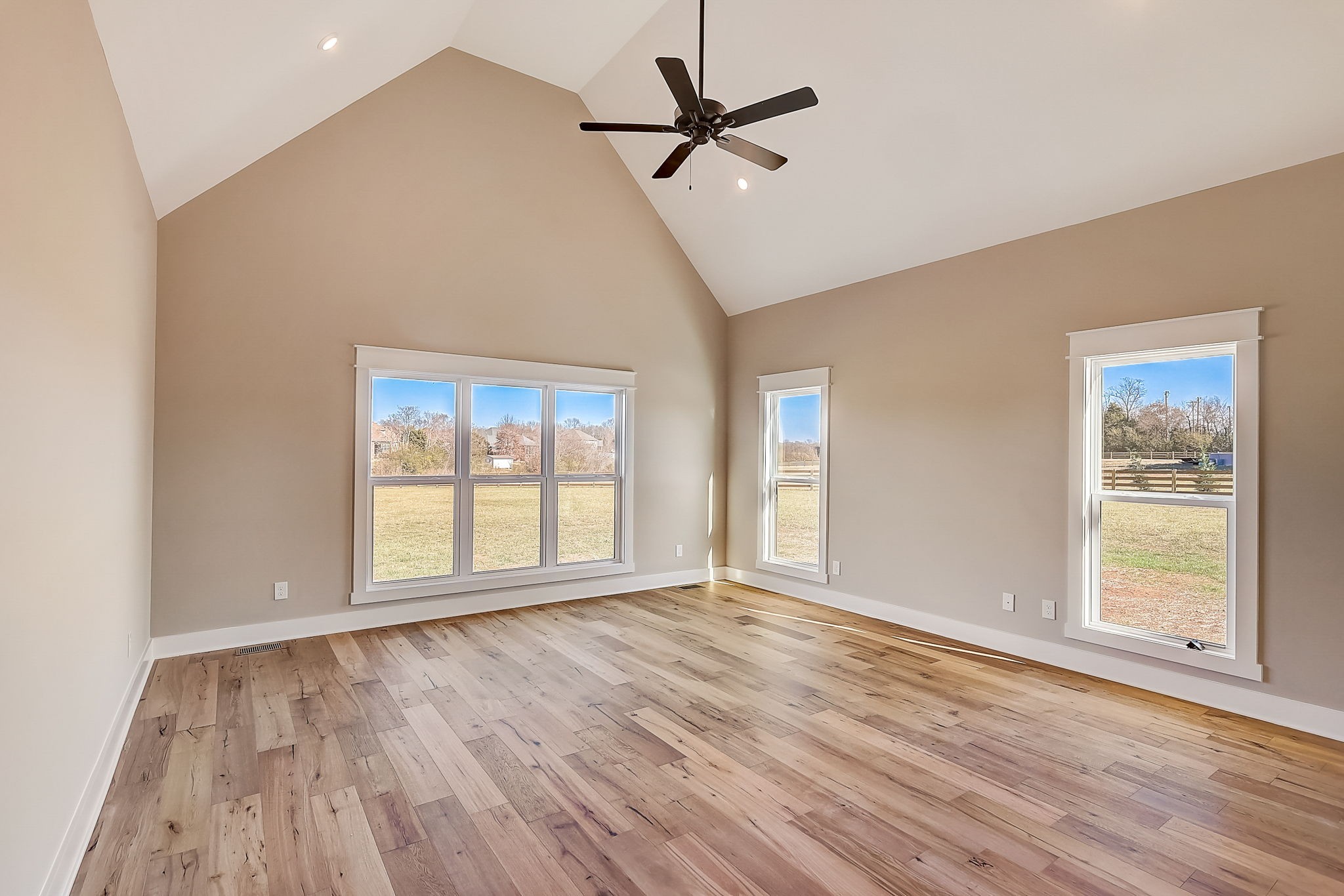 9665 McKee Road Lascassas, TN 37085 - Photo 8 of 15 a view of an empty room with a window and wooden floor