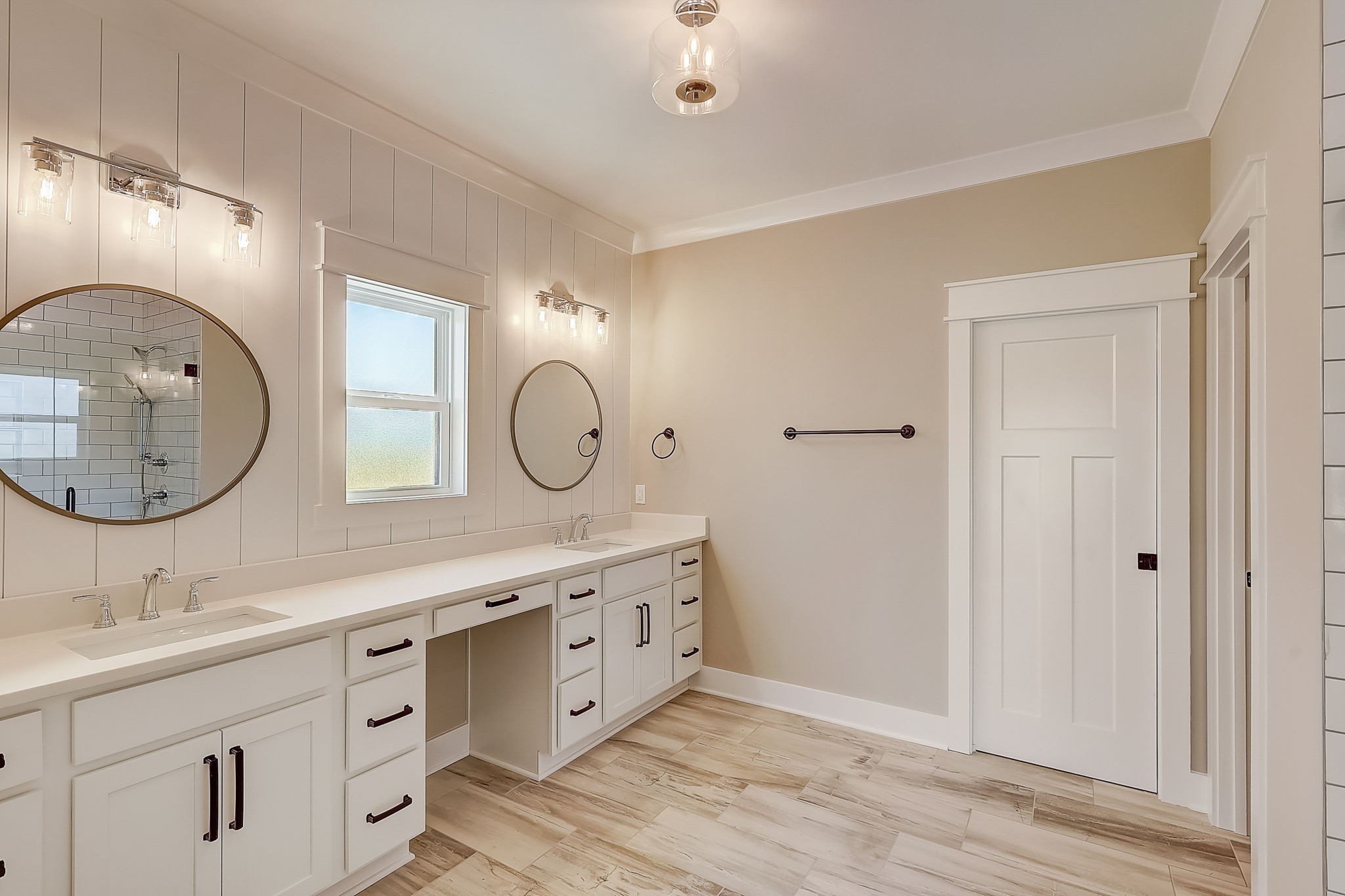 9665 McKee Road Lascassas, TN 37085 - Photo 10 of 15 a bathroom with a double vanity sink and a mirror
