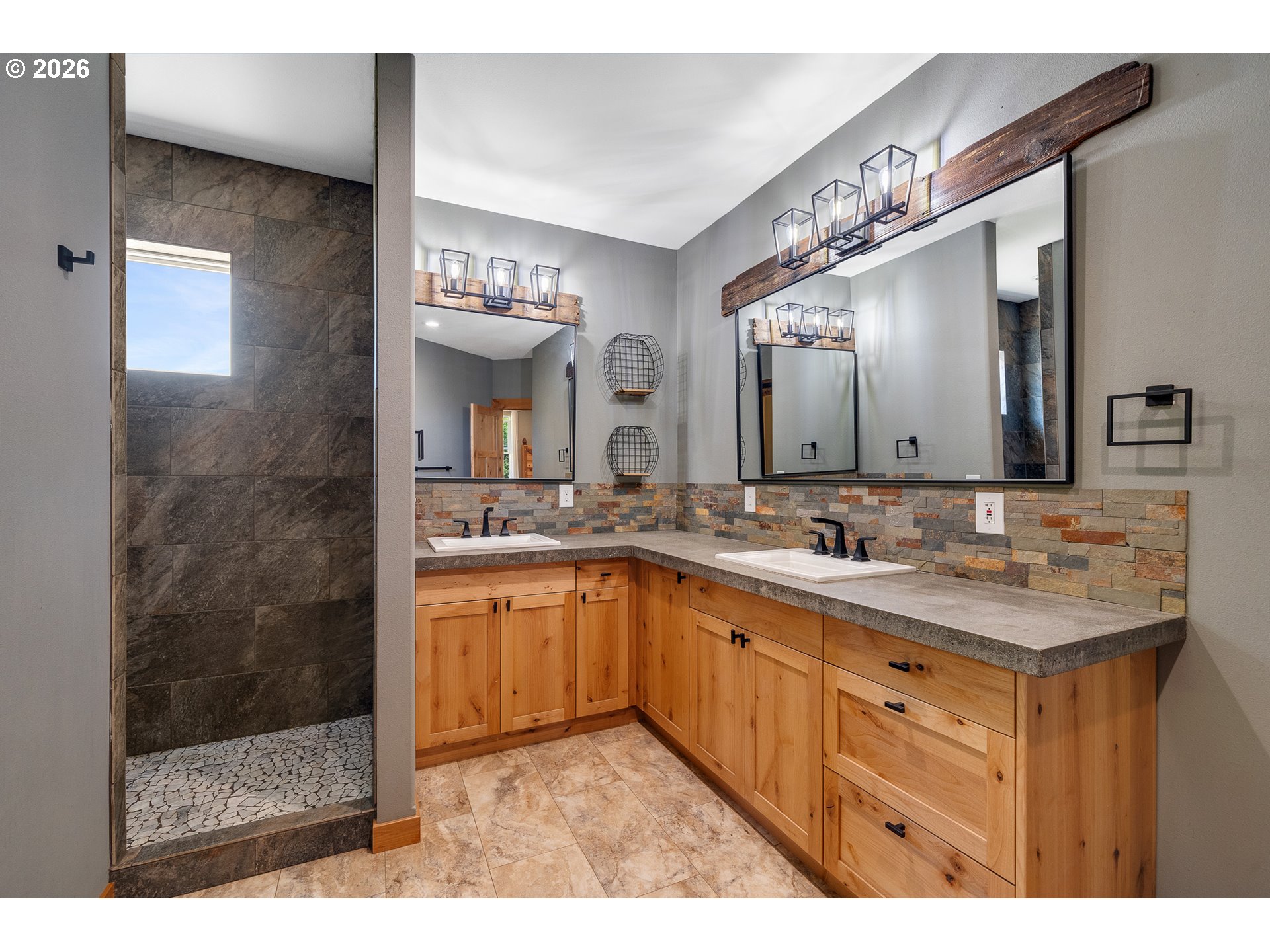 850 Hodgdon Road Tillamook, OR 97141 - Photo 25 of 43 a bathroom with a granite countertop sink mirror and double