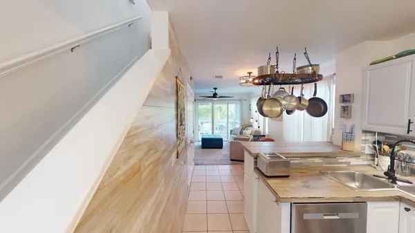 a kitchen with stainless steel appliances granite countertop a sink and stove