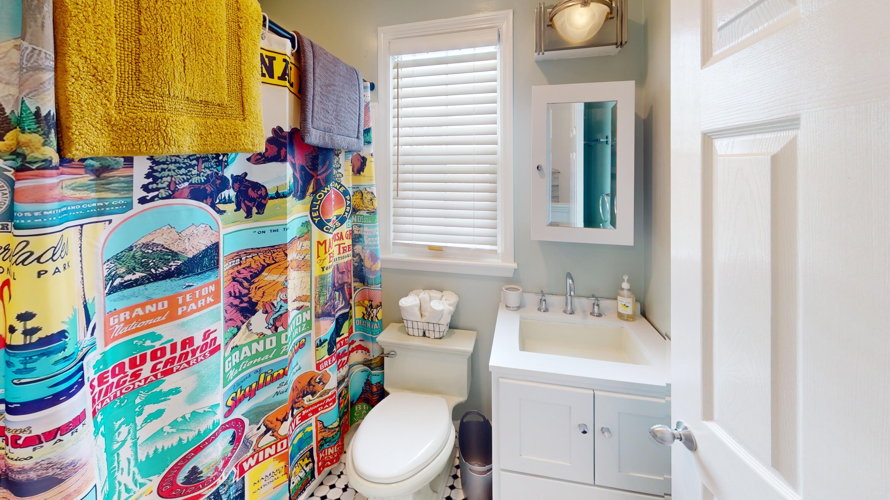 48 Merganser Lane Key West, FL 33040 - Photo 13 of 29 a bathroom with a toilet sink and curtain