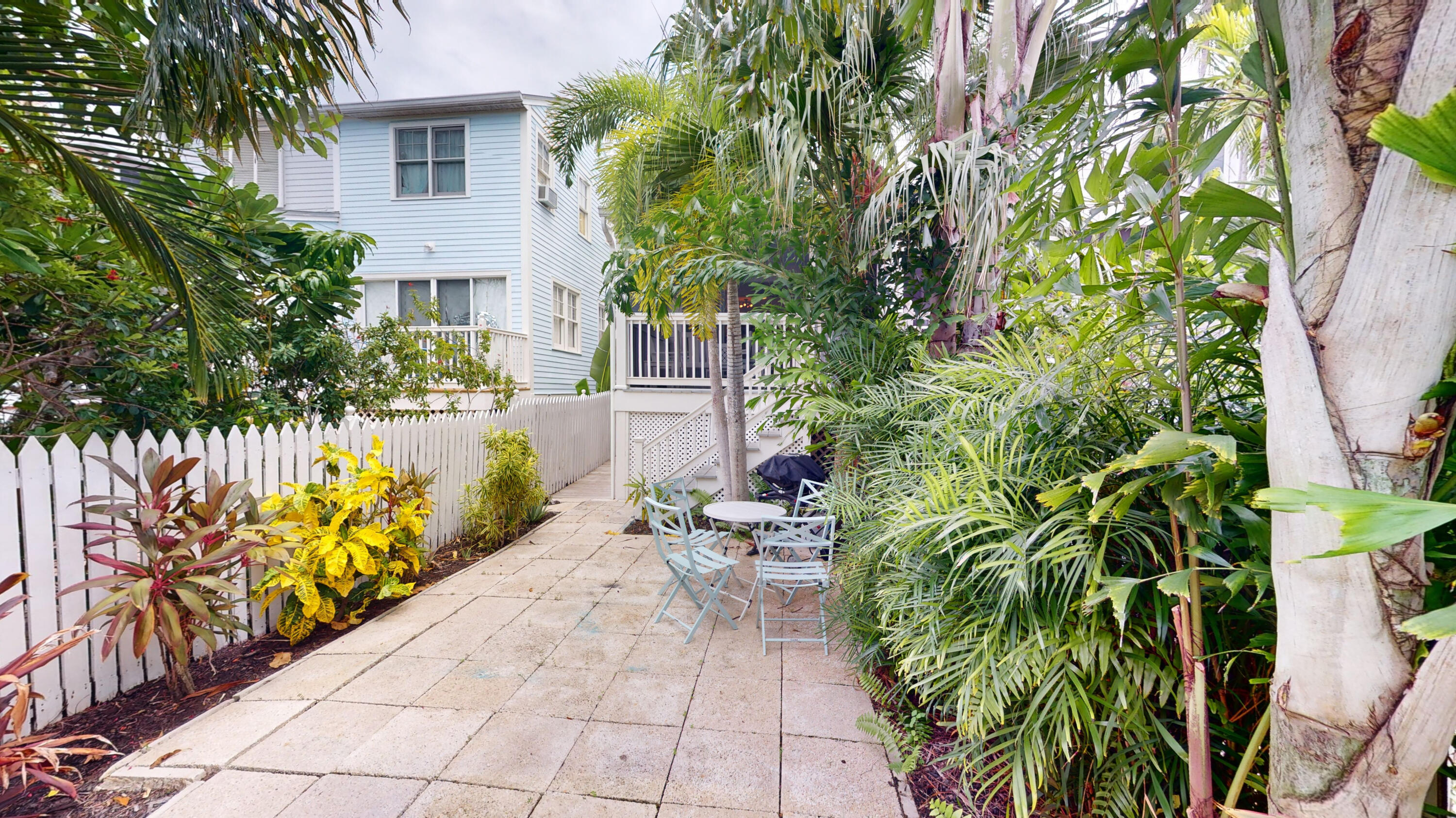 48 Merganser Lane Key West, FL 33040 - Photo 21 of 29 a view of a backyard with potted plants