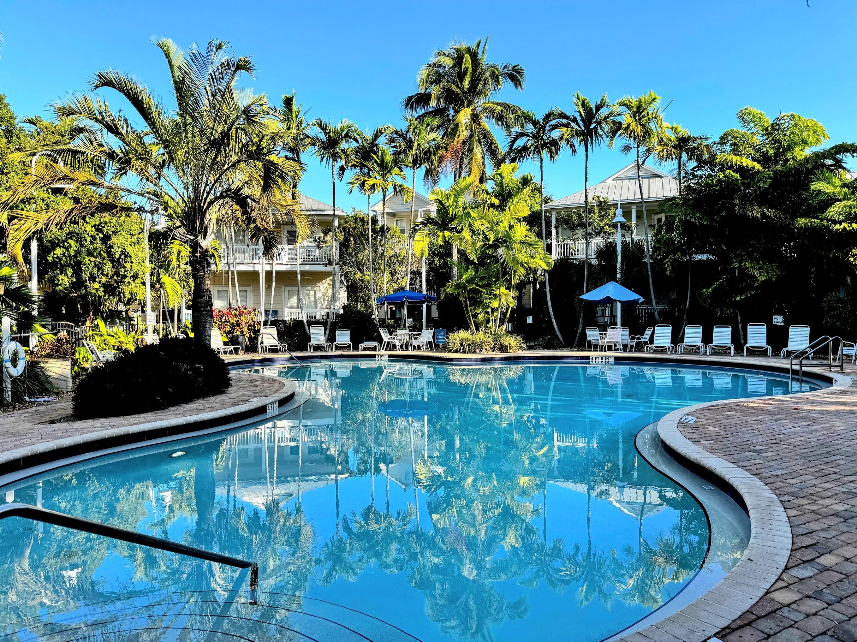48 Merganser Lane Key West, FL 33040 - Photo 27 of 29 a view of swimming pool with outdoor seating