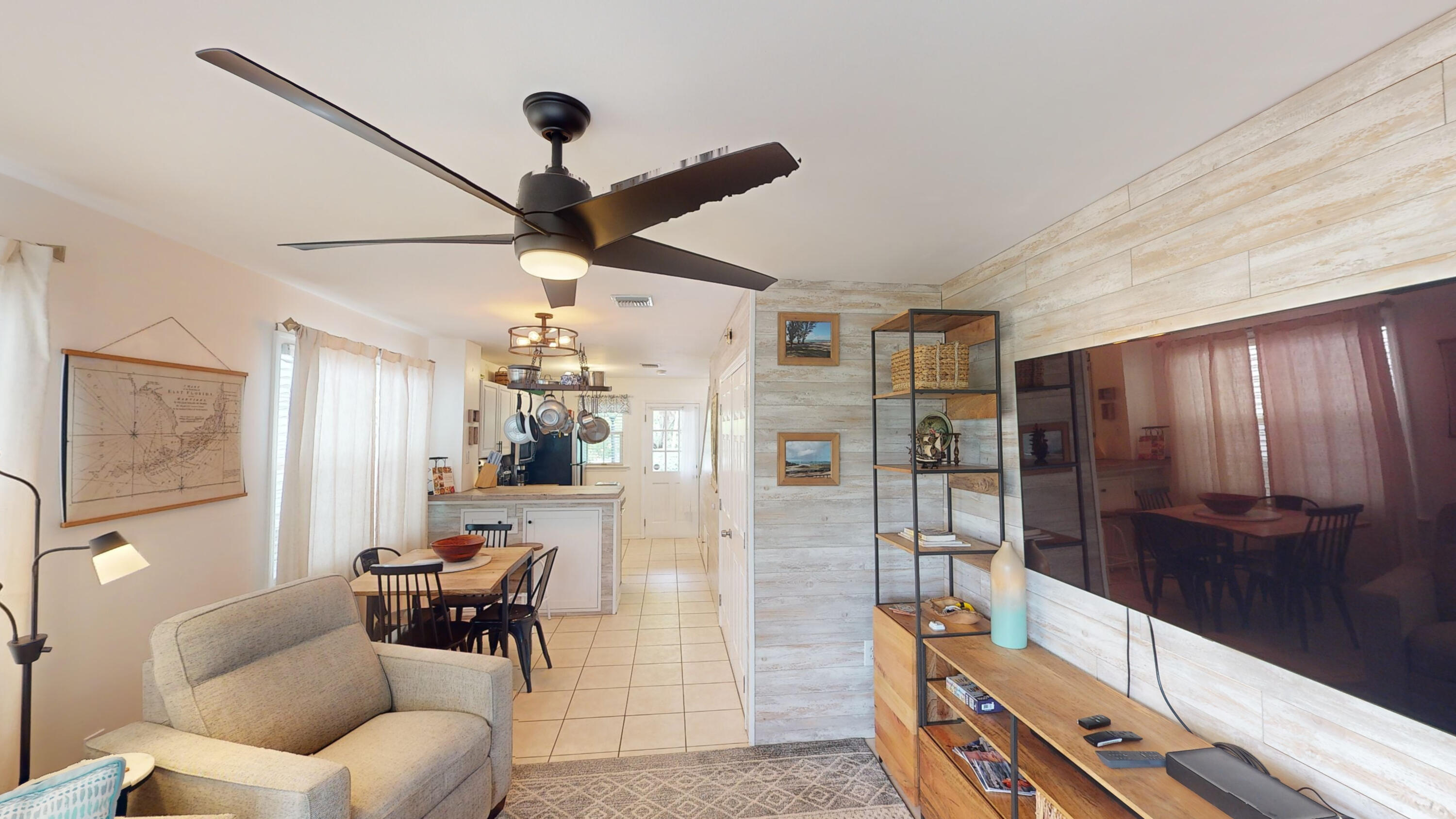 48 Merganser Lane Key West, FL 33040 - Photo 4 of 29 a living room with furniture and a chandelier