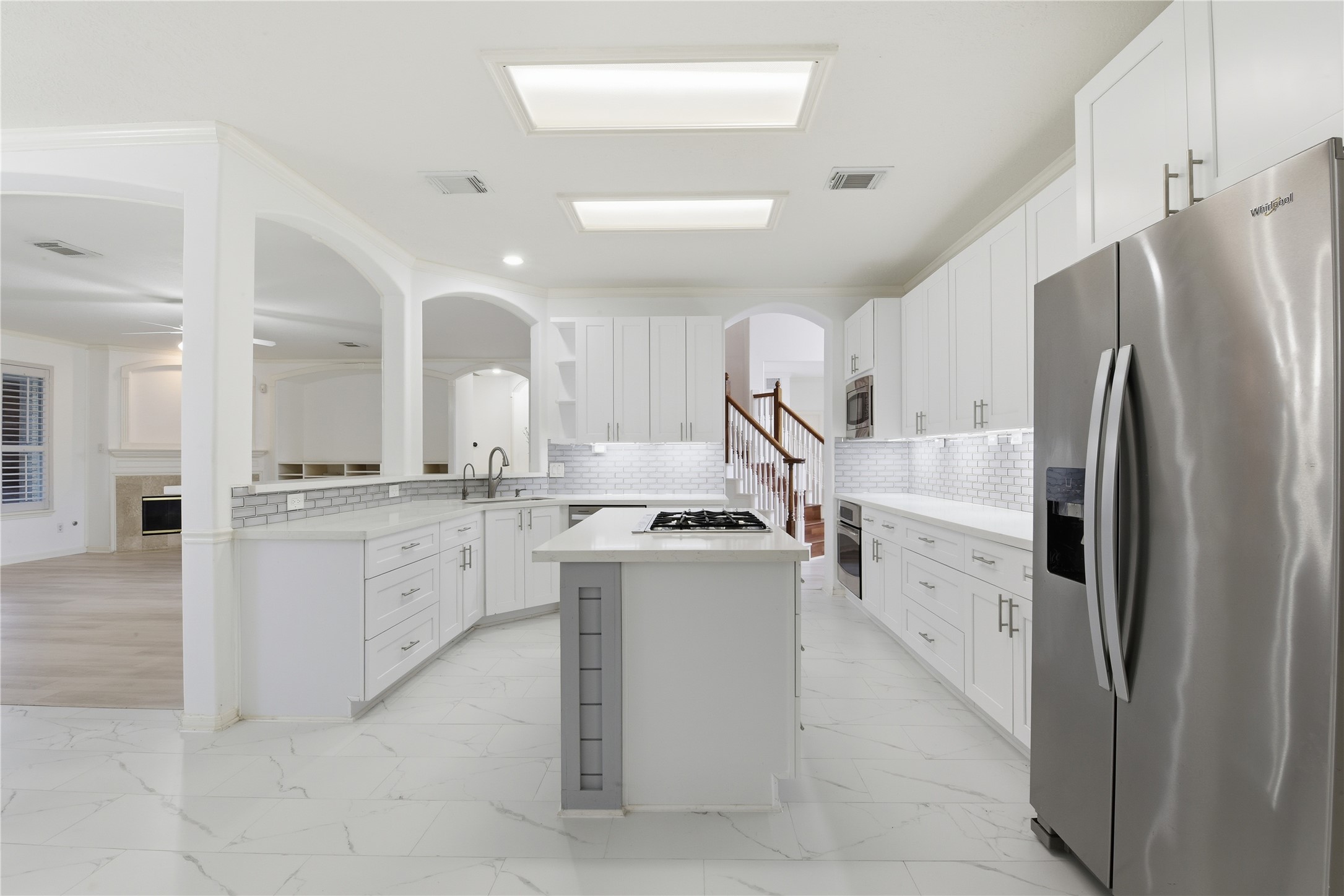 16614 Shorecrest Drive Houston, TX 77095 - Photo 14 of 50 a kitchen with cabinets and stainless steel appliances