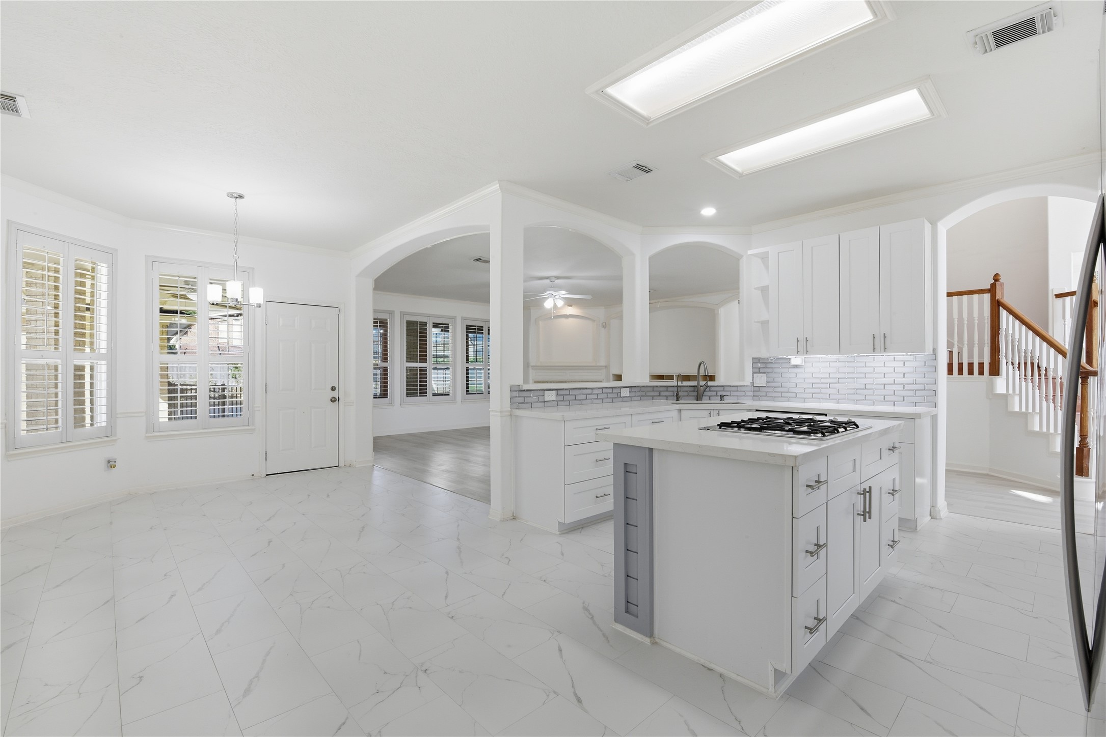 16614 Shorecrest Drive Houston, TX 77095 - Photo 18 of 50 a kitchen with granite countertop a stove and a sink