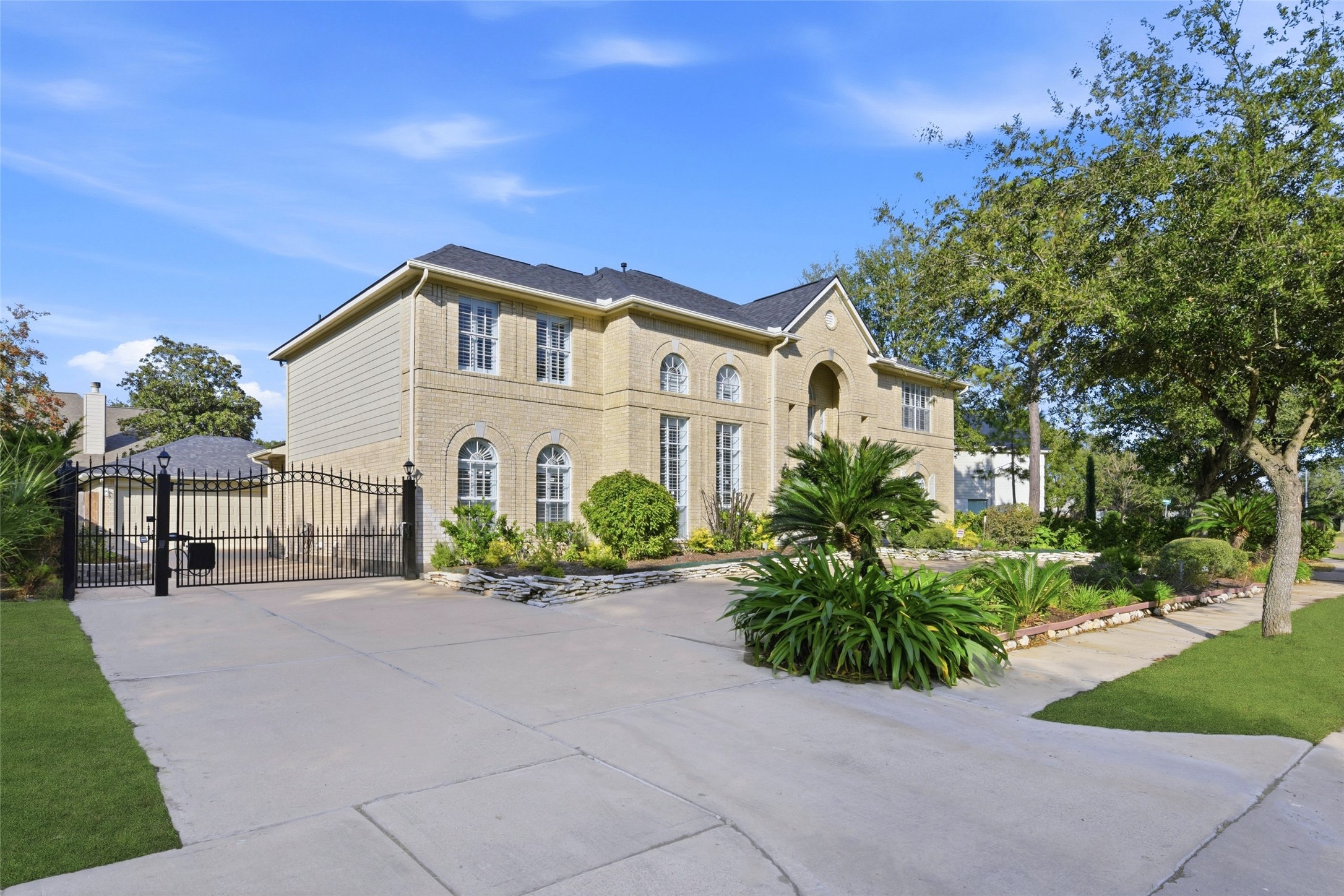 16614 Shorecrest Drive Houston, TX 77095 - Photo 2 of 50 a front view of a house with garden