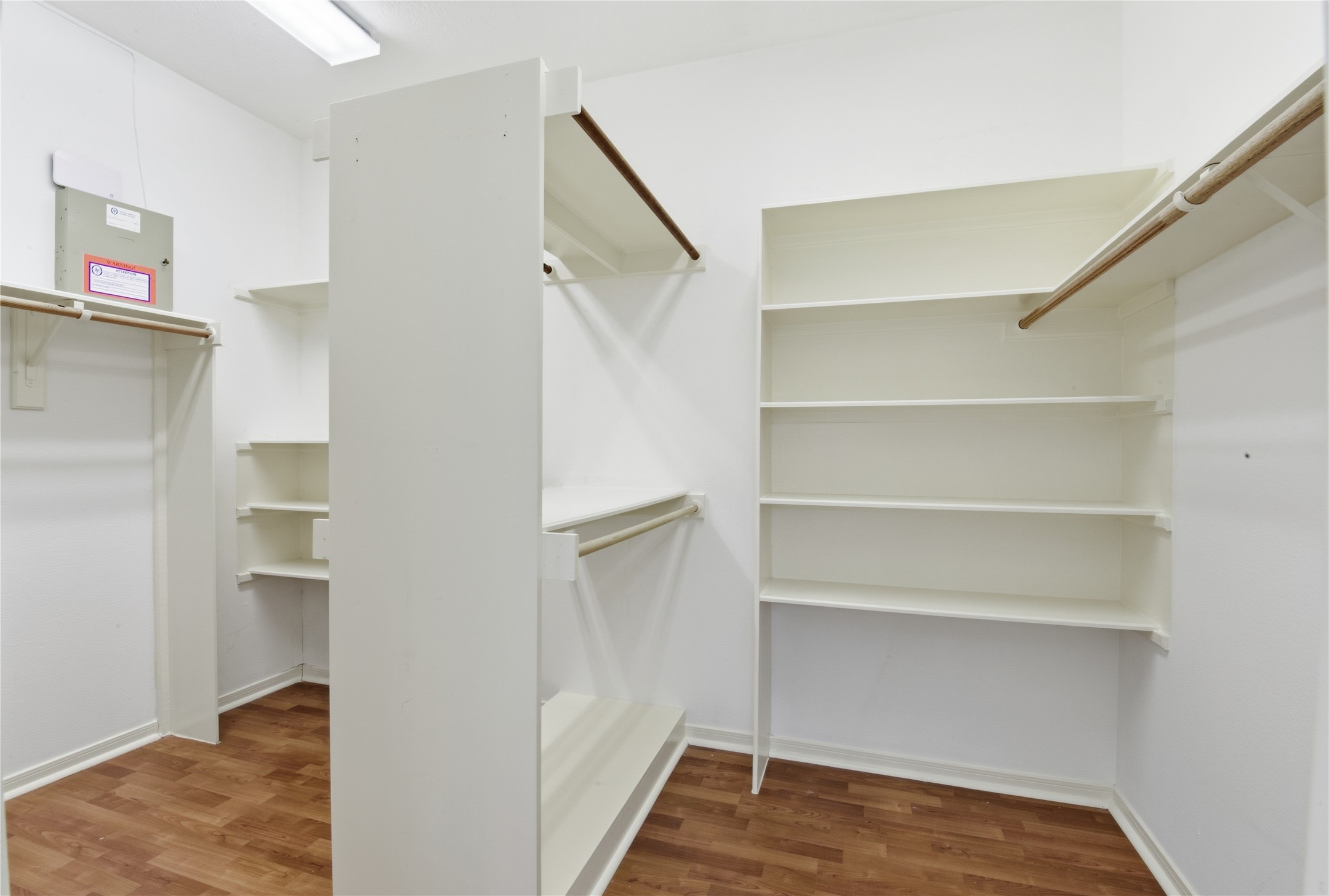 16614 Shorecrest Drive Houston, TX 77095 - Photo 25 of 50 a view of walk in closet with empty racks