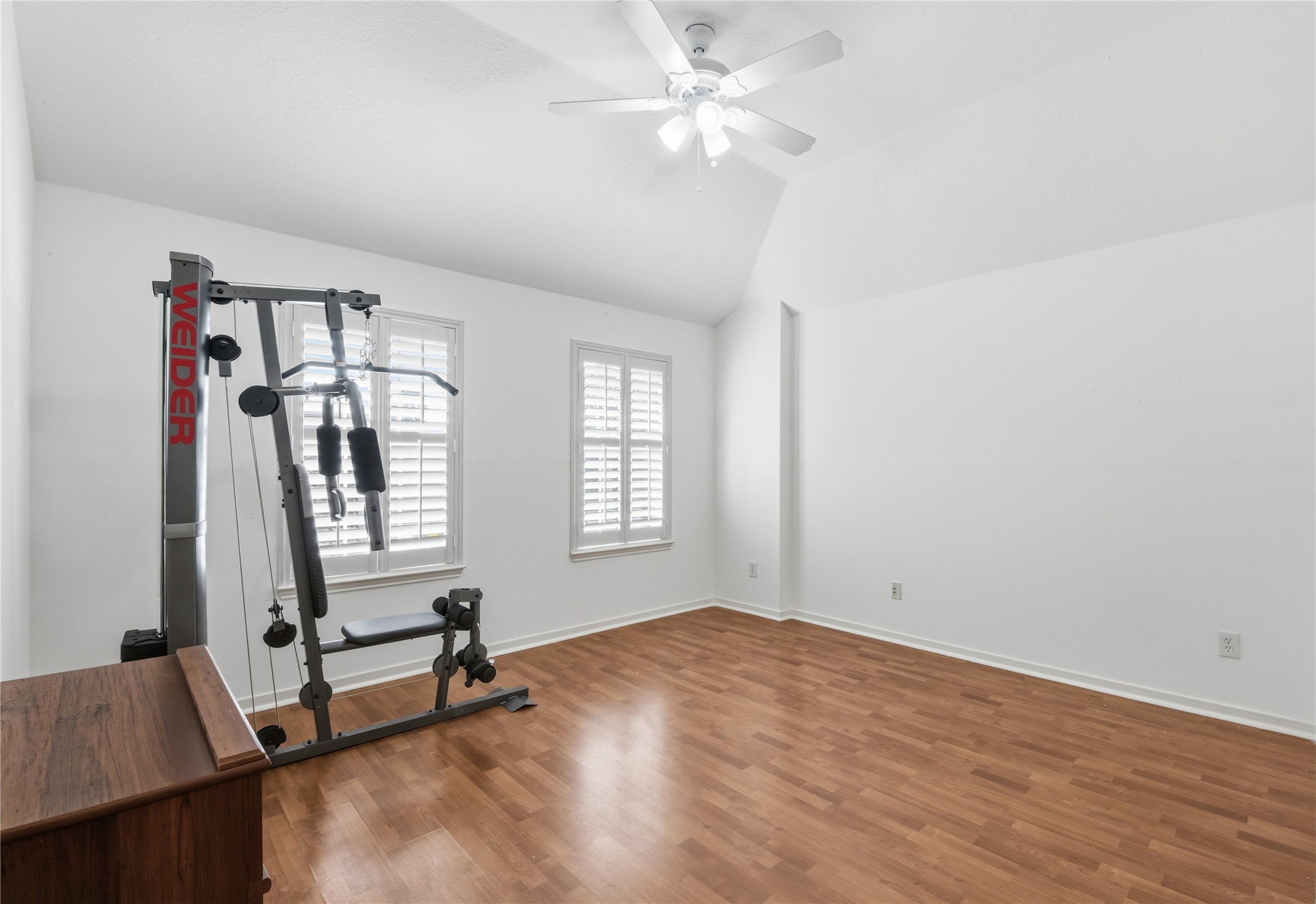 16614 Shorecrest Drive Houston, TX 77095 - Photo 29 of 50 an empty room with windows and ceiling fan