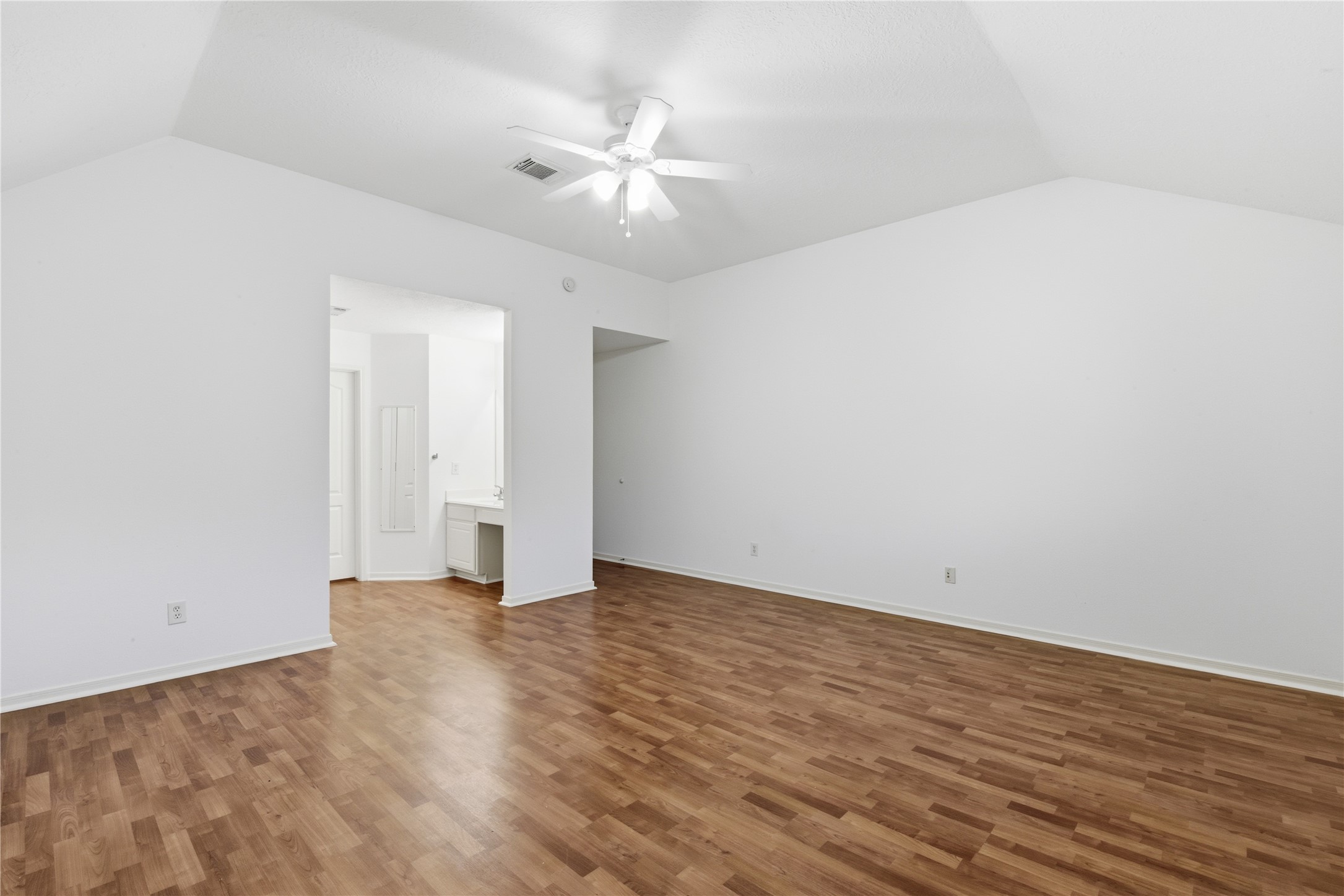 16614 Shorecrest Drive Houston, TX 77095 - Photo 33 of 50 a view of an empty room with wooden floor and a ceiling fan