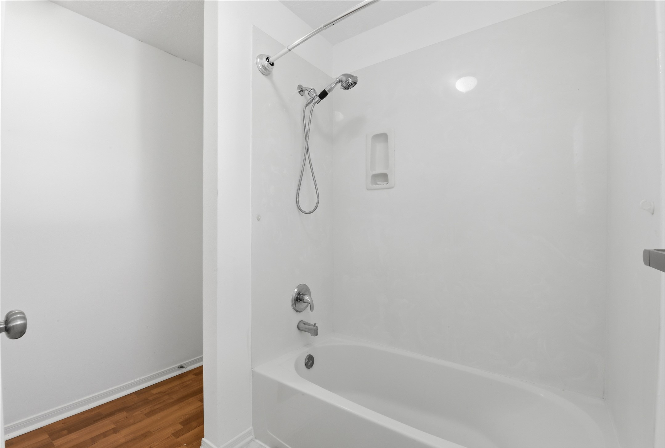 16614 Shorecrest Drive Houston, TX 77095 - Photo 35 of 50 a bathroom with a bathtub