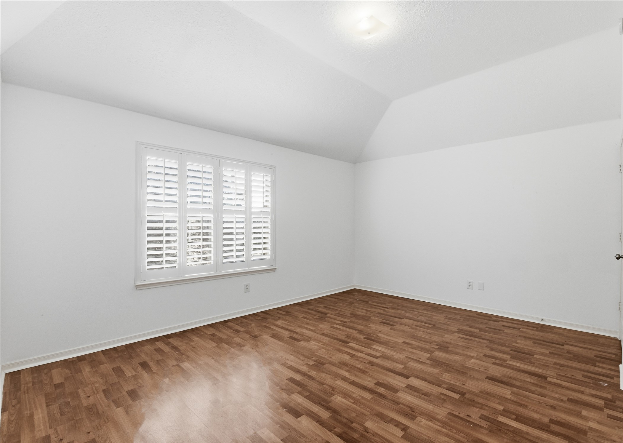 16614 Shorecrest Drive Houston, TX 77095 - Photo 37 of 50 a view of an empty room with wooden floor and a window
