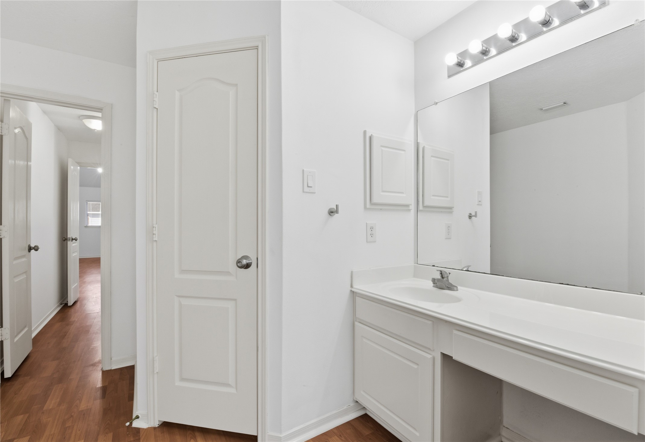 16614 Shorecrest Drive Houston, TX 77095 - Photo 38 of 50 a bathroom with a double vanity sink and mirror