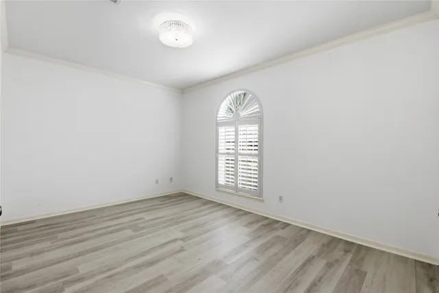 a bathroom with a granite countertop sink toilet tub and shower