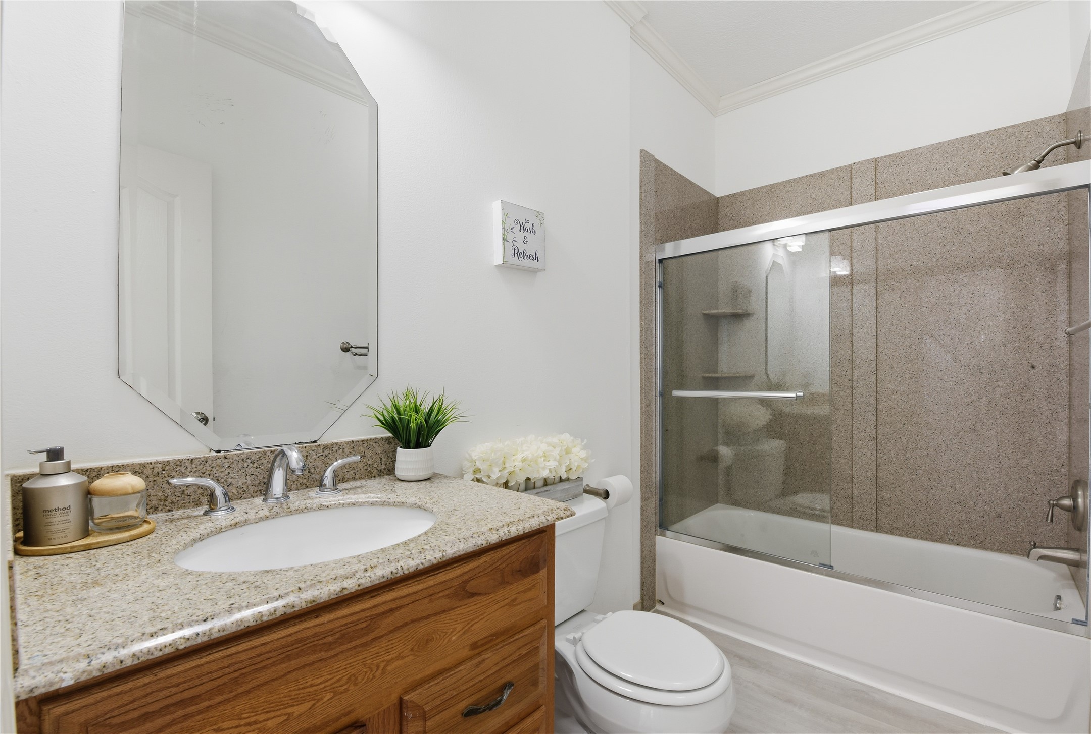 16614 Shorecrest Drive Houston, TX 77095 - Photo 42 of 50 a bathroom with a granite countertop sink toilet tub and shower