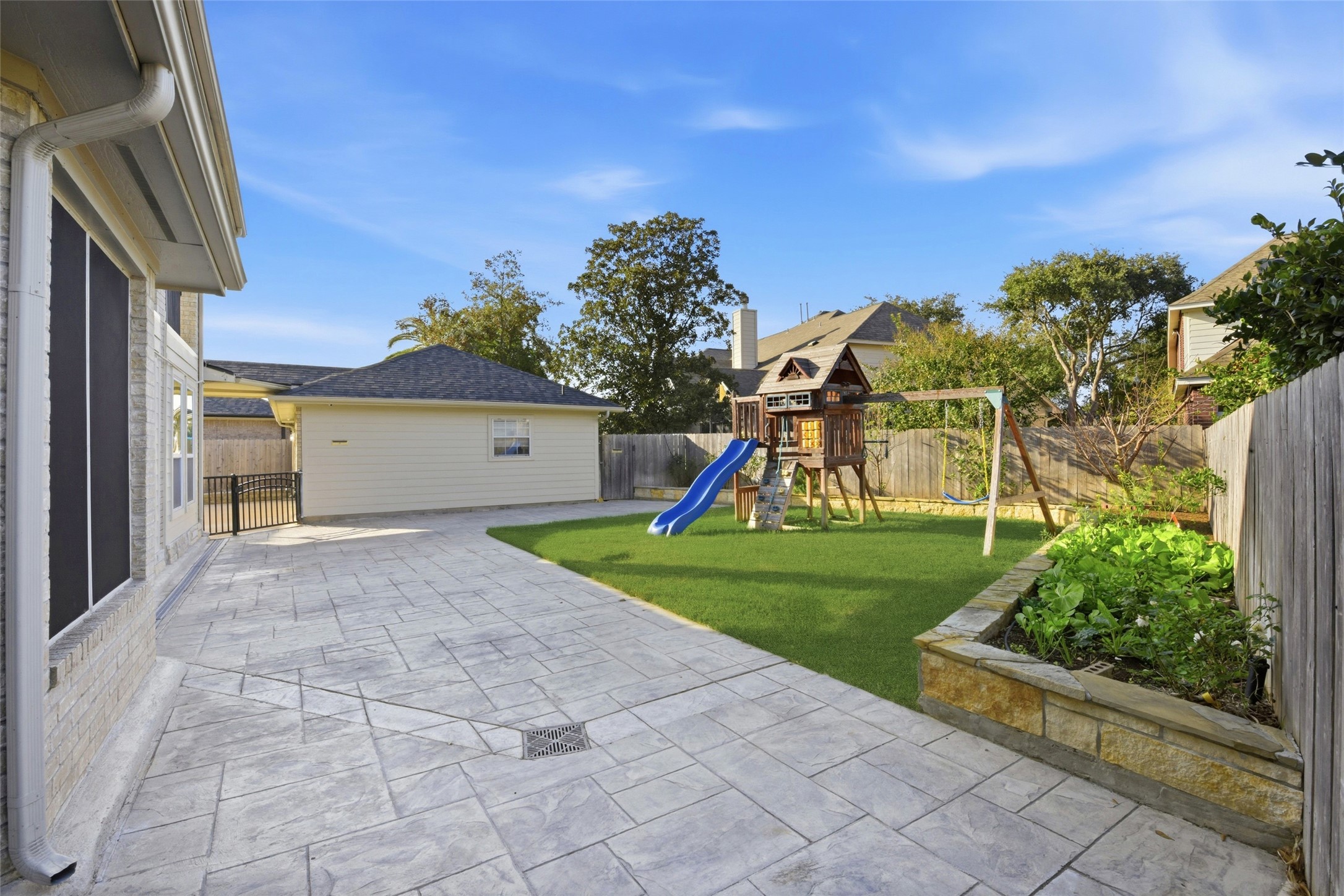 16614 Shorecrest Drive Houston, TX 77095 - Photo 44 of 50 a view of a house with a yard and a garage