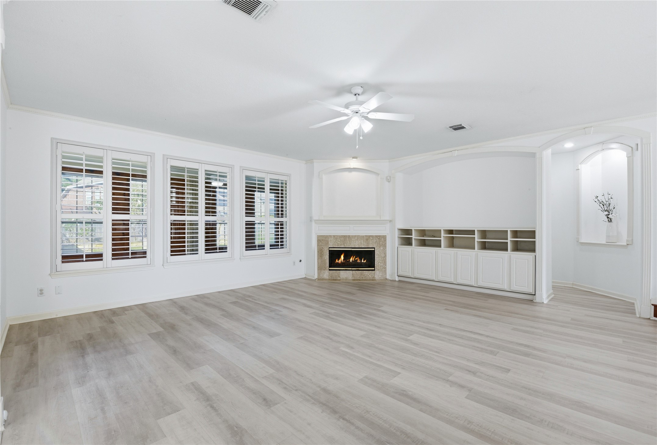 16614 Shorecrest Drive Houston, TX 77095 - Photo 10 of 50 a view of an empty room with a kitchen and a window