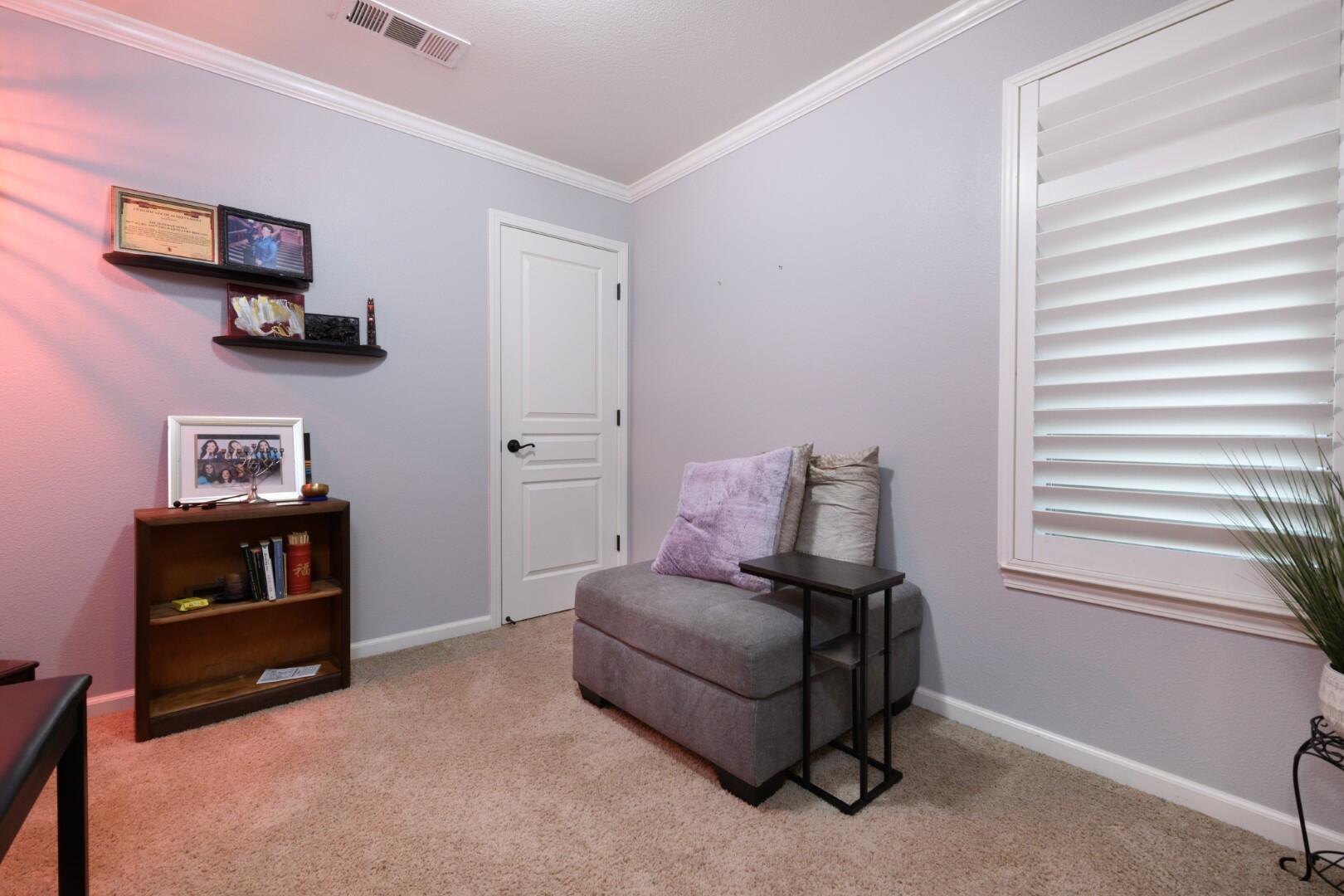 671 Valleybrook Drive Redding, CA 96003 - Photo 18 of 20 a living room with furniture and a window
