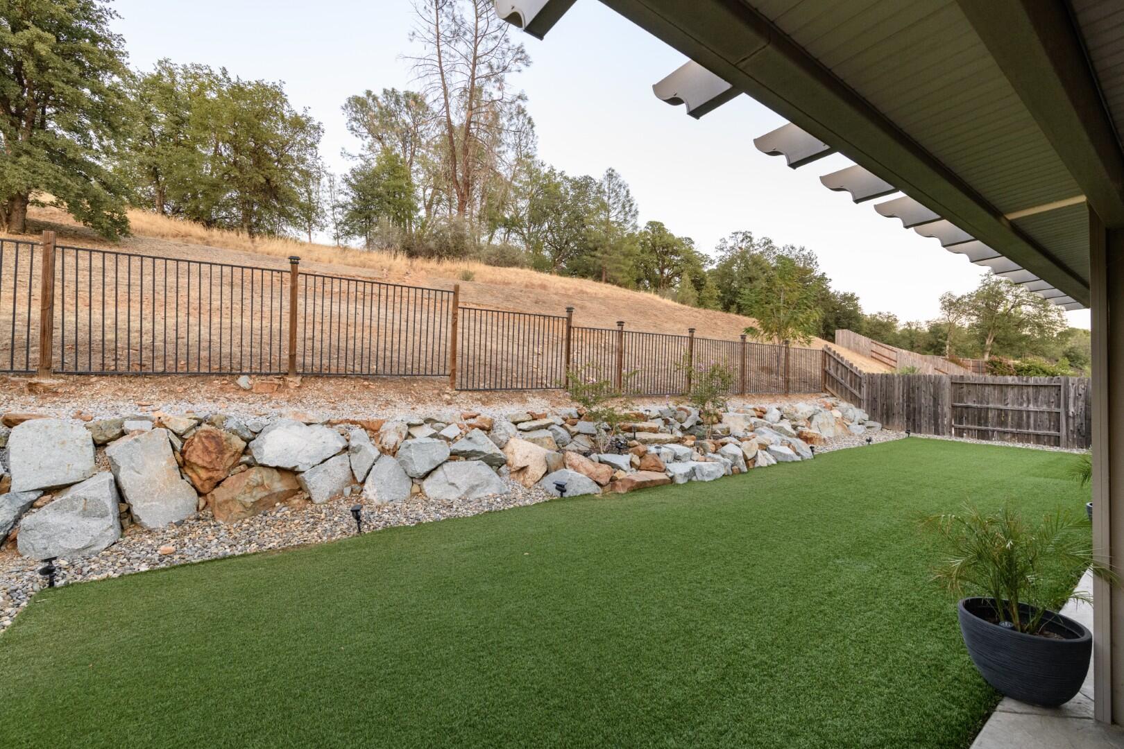 671 Valleybrook Drive Redding, CA 96003 - Photo 19 of 20 a view of a backyard