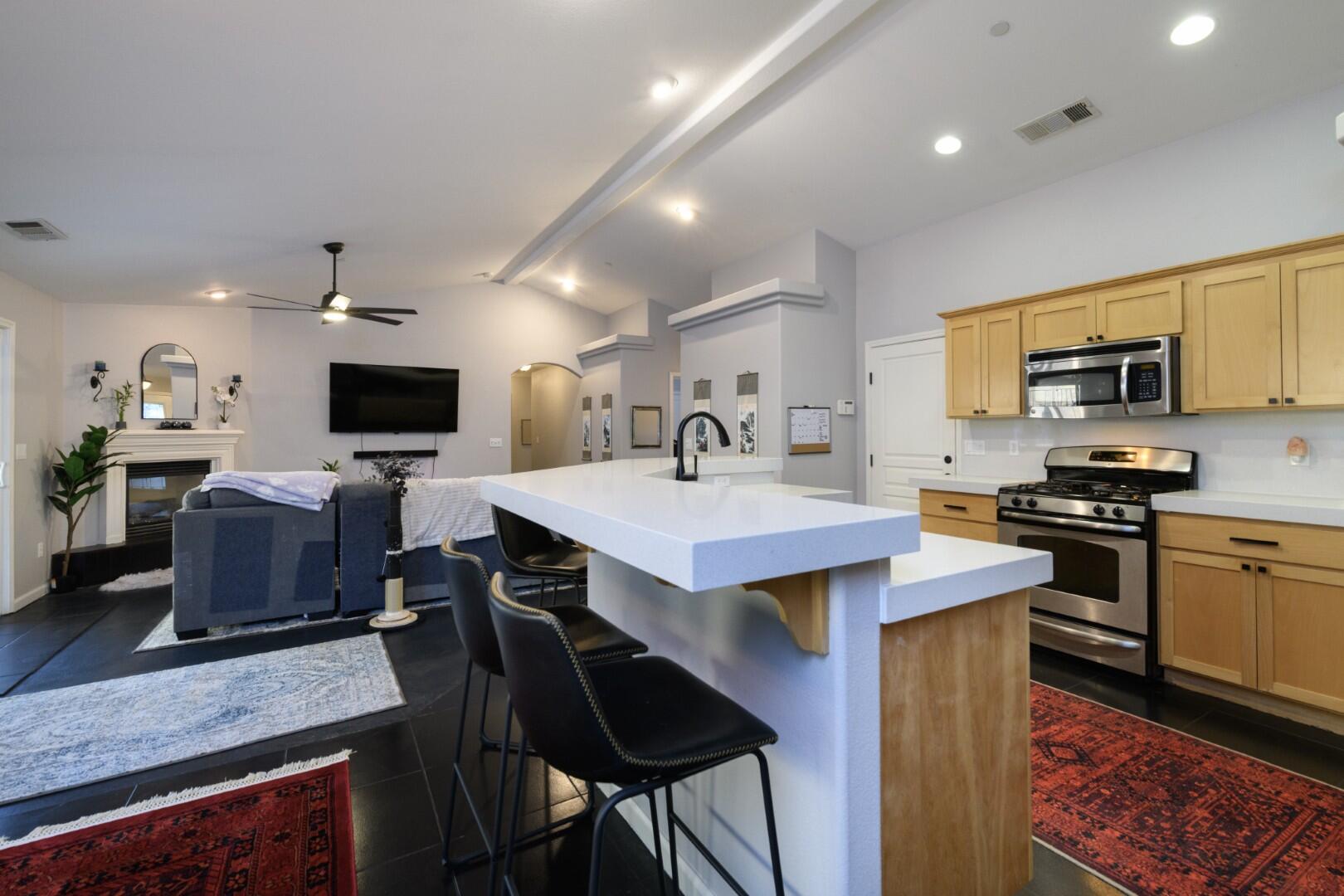 671 Valleybrook Drive Redding, CA 96003 - Photo 20 of 20 a kitchen with a sink stainless steel appliances and cabinets