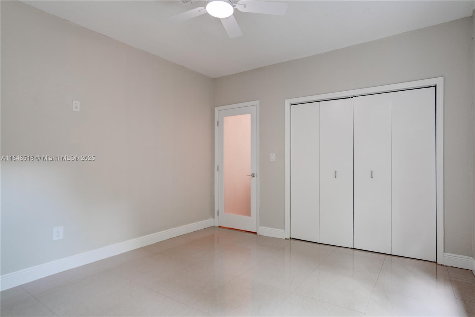 2217 Red Road Coral Gables, FL 33155 - Photo 20 of 33 a view of an empty room with a fan